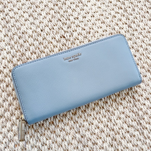 kate spade Handbags - kate spade light blue zip-around continental wallet